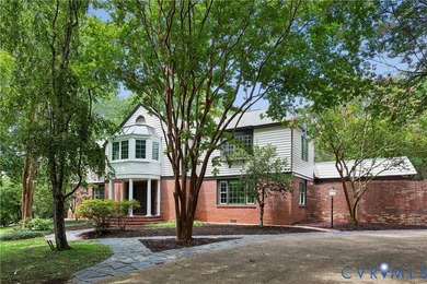 Hidden among mature trees on a rare double lot, this exceptional - photo 3