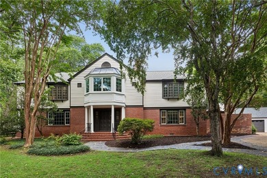 Hidden among mature trees on a rare double lot, this exceptional - photo 6