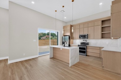 Experience modern waterfront luxury in this stunning - photo 6