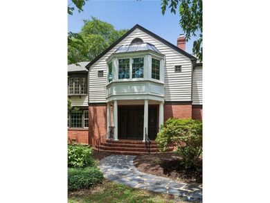 Hidden among mature trees on a rare double lot, this exceptional - photo 7