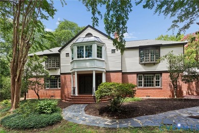 Hidden among mature trees on a rare double lot, this exceptional - photo 8