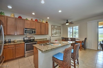 Turnkey with stunning lake and golf course views! This home - photo 8