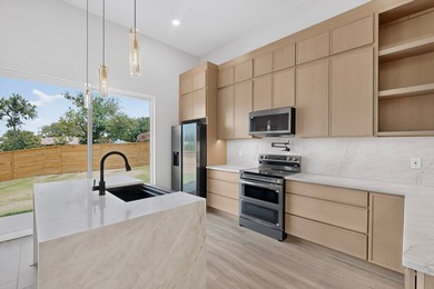 Experience modern waterfront luxury in this stunning - photo 9
