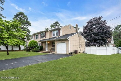 Welcome to Pine Lake Park, this spacious 4-bedroom, 2.5-bath - photo 2
