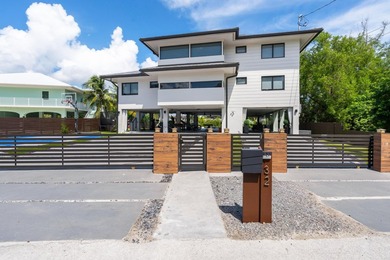 This Key Largo Lake front estate delivers a level of design and - photo 1
