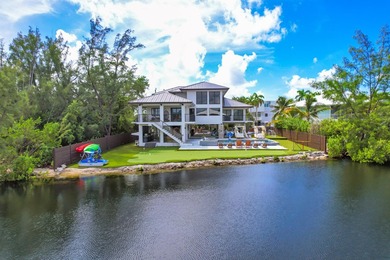 This Key Largo Lake front estate delivers a level of design and - photo 6