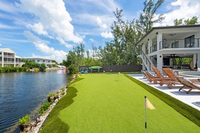 This Key Largo Lake front estate delivers a level of design and - photo 7
