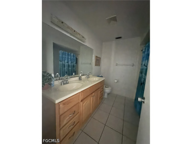 This move-in-ready 2-bedroom, 1-bathroom ground-floor condo - photo 7