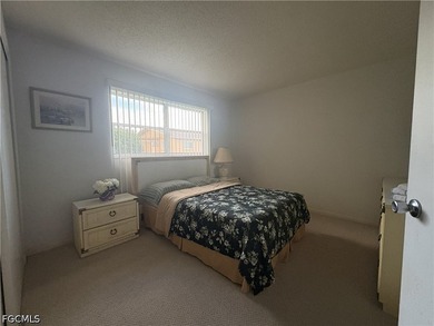 This move-in-ready 2-bedroom, 1-bathroom ground-floor condo - photo 9