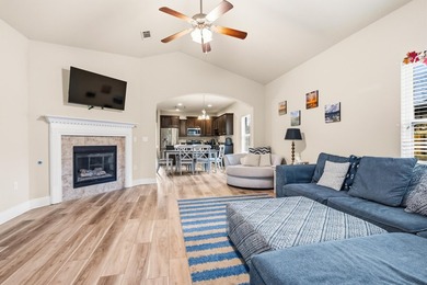 Newer LVP flooring flows through this open-concept Hammock Bay - photo 13