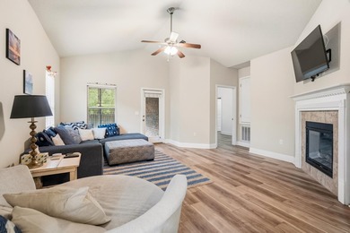 Newer LVP flooring flows through this open-concept Hammock Bay - photo 14