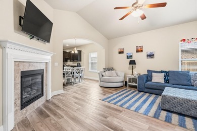 Newer LVP flooring flows through this open-concept Hammock Bay - photo 16