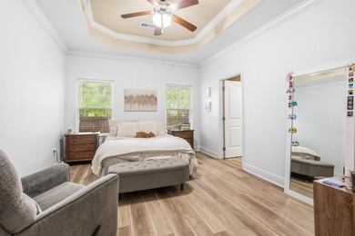 Newer LVP flooring flows through this open-concept Hammock Bay - photo 17