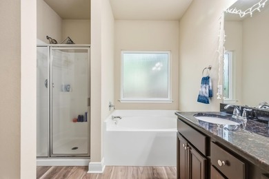 Newer LVP flooring flows through this open-concept Hammock Bay - photo 20