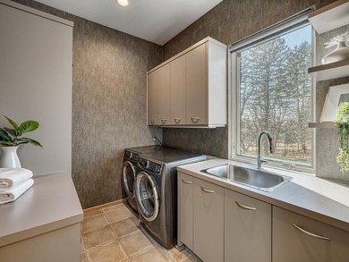 Situated on over five acres along the shores of Sunfish Lake - photo 27
