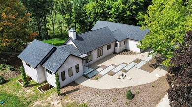 This newly constructed, architecturally designed home offers a - photo 1