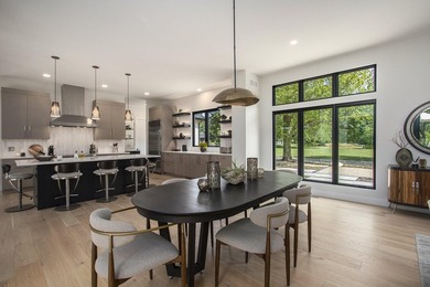 This newly constructed, architecturally designed home offers a - photo 9