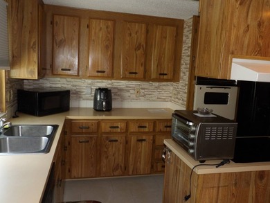 2 BR 2 BA 1248 SQ FT home on a perimeter lot with view of the - photo 31