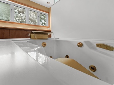 Tucked away behind a private tree-lined drive in one of - photo 25