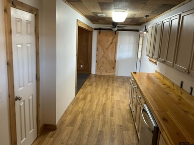 Charming 3 bedroom, 2 bath home situated on approximately .41