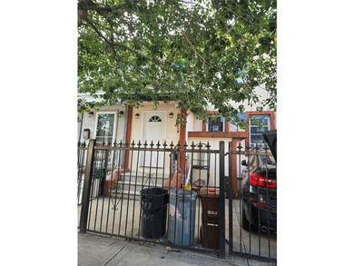 Welcome to this beautifully maintained attached one-family home - photo 2