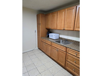 Welcome to this beautifully maintained attached one-family home - photo 6