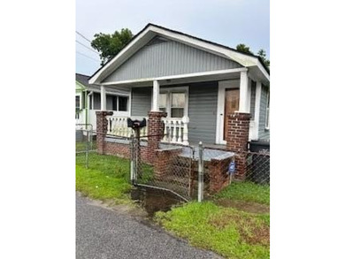 Unlock the potential of this 4 bedroom, 1 bath home in the heart - photo 6