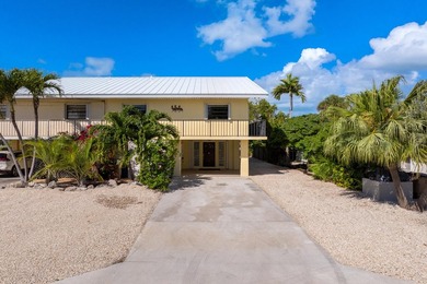 Discover exceptional waterfront living in the heart of Key - photo 2