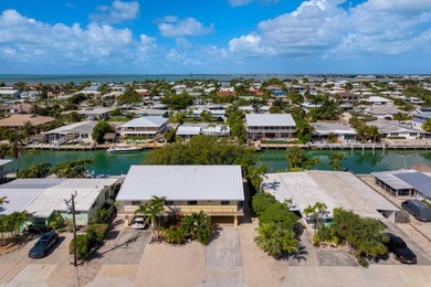 Discover exceptional waterfront living in the heart of Key - photo 3