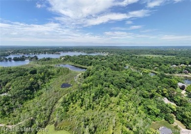 Lake Acreage For Sale in Commerce Twp, Michigan