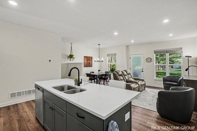 Welcome to effortless lakeside living. Built in 2025, this - photo 8