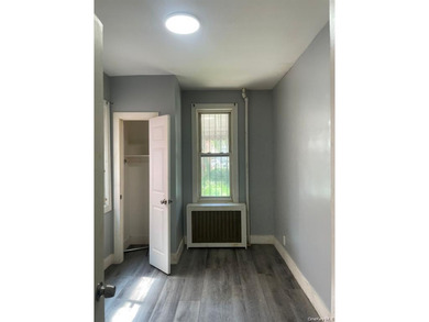 Fully renovated detached brick 3 family in the Wakefield section - photo 6