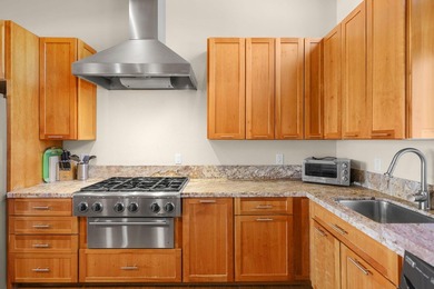 Discover custom living with breathtaking panoramic views of Lake - photo 21