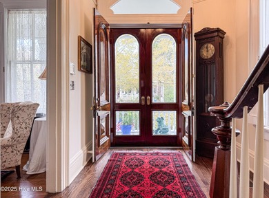 This meticulously maintained Italianate home is presented for