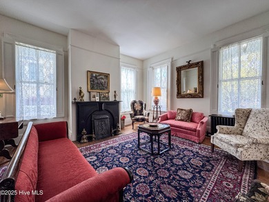 This meticulously maintained Italianate home is presented for