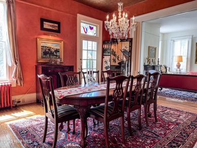 This meticulously maintained Italianate home is presented for