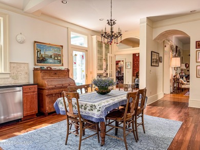 This meticulously maintained Italianate home is presented for