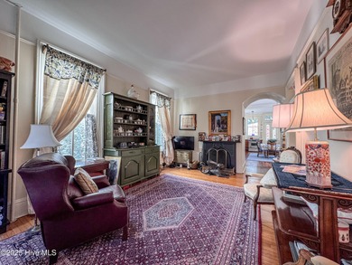 This meticulously maintained Italianate home is presented for