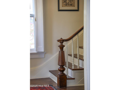 This meticulously maintained Italianate home is presented for