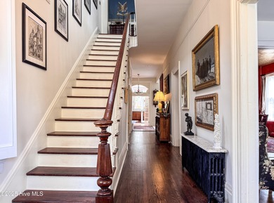 This meticulously maintained Italianate home is presented for