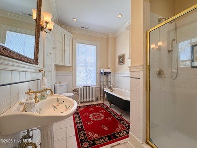 This meticulously maintained Italianate home is presented for