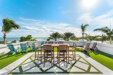 Stunning Plantation Key canal front pool home! This exceptional - photo 1