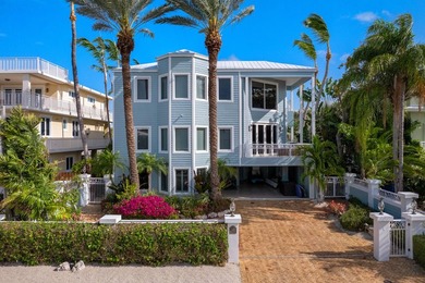 Stunning Plantation Key canal front pool home! This exceptional - photo 2