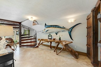 Stunning Plantation Key canal front pool home! This exceptional - photo 5
