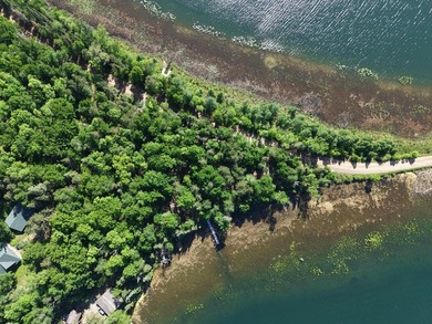 Discover your perfect escape on Mantrap Lake, one of the area's - photo 19