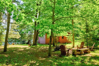 Discover your perfect escape on Mantrap Lake, one of the area's - photo 29