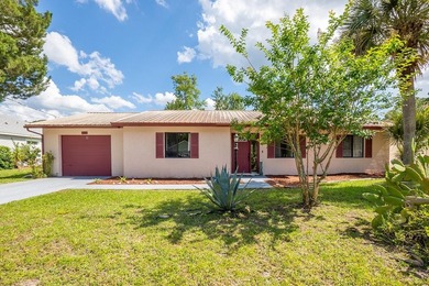 Welcome to this well-maintained 3-bedroom, 2-bath home located - photo 1