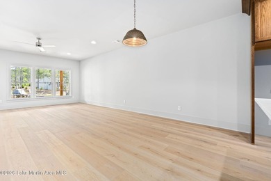 Positioned within White Oak Landing, this 5 bedroom, 3 bath lake - photo 15