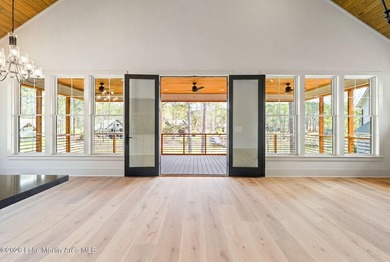 Positioned within White Oak Landing, this 5 bedroom, 3 bath lake - photo 23