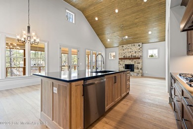 Positioned within White Oak Landing, this 5 bedroom, 3 bath lake - photo 27